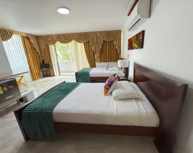 Habitación múltiple 301 del Hotel Boutique Luxury en Cali